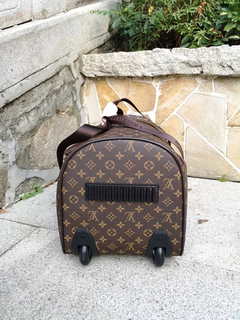 Traveling Bag with Wheels and Adjustable Handle
