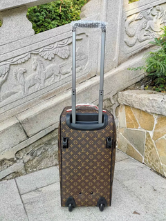 Traveling Bag with Wheels and Adjustable Handle